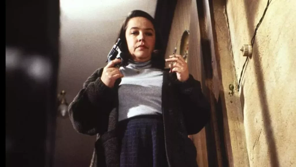 Kathy Bates como Annie em Louca Obsessão