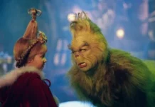 5 filmes clássicos de Natal Taylor Momsen e Jim Carrey em "O Grinch" (2000) • Divulgação