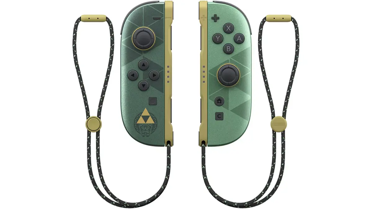 Joy-Con 2 da edicao 40 anos de Zelda: verdes com detalhes dourados, simbolo da Trifórcia e alcas combinando