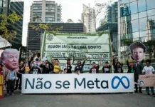 Suposta interferência da Meta na eleição: denúncias, respostas e o TSE Protesto contra a Meta em São Paulo durante a eleição de 2026, com faixa Não se Meta